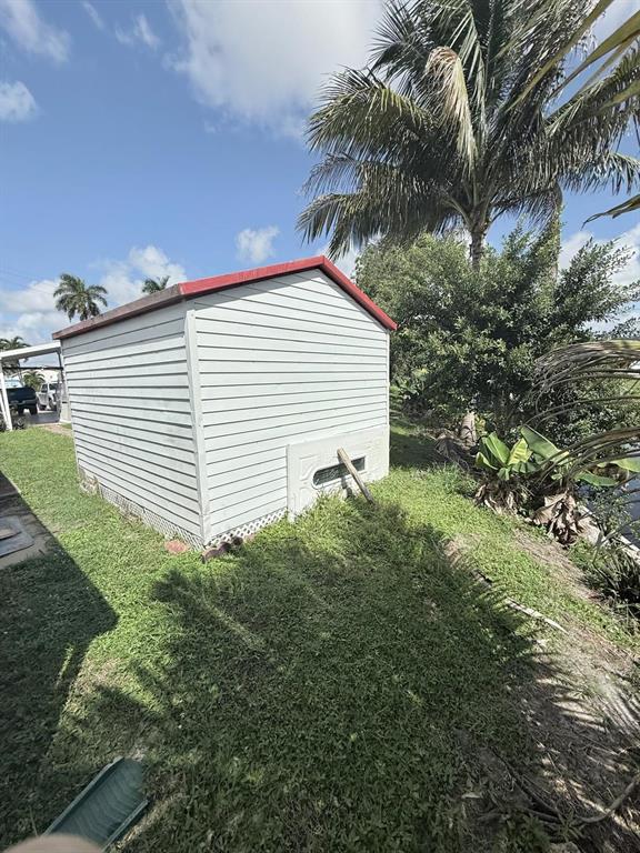 2090 Southwest 85th Avenue Davie, FL 33324 - Photo 24 of 37 a view of a house with a yard