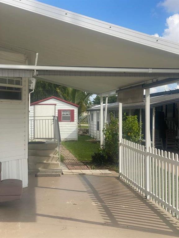 2090 Southwest 85th Avenue Davie, FL 33324 - Photo 26 of 37 a view of entrance gate of a house