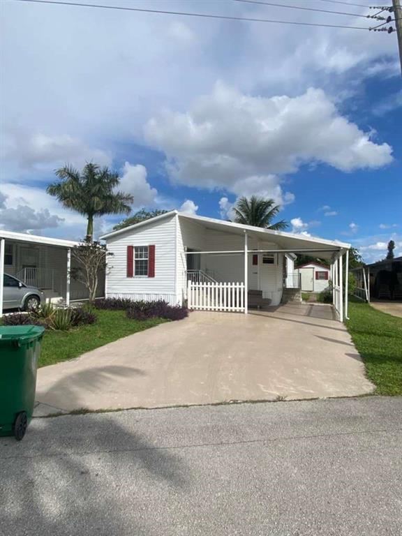 2090 Southwest 85th Avenue Davie, FL 33324 - Photo 27 of 37 a view of a house with a yard