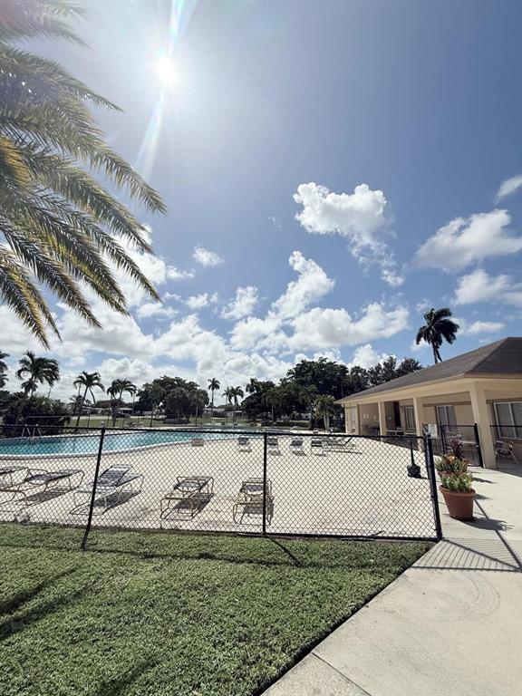 2090 Southwest 85th Avenue Davie, FL 33324 - Photo 36 of 37 a front view of a house with a yard