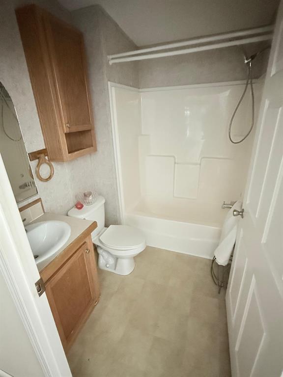 2090 Southwest 85th Avenue Davie, FL 33324 - Photo 7 of 37 a bathroom with a granite countertop sink toilet and shower