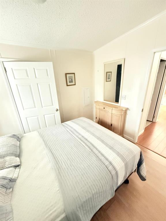 2090 Southwest 85th Avenue Davie, FL 33324 - Photo 9 of 37 a bedroom with a bed and a large mirror