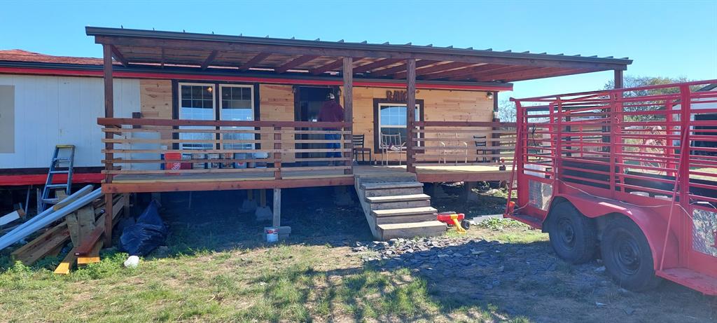 516 Private Road 2308 Quinlan, TX 75474 - Photo 7 of 13 a view of a chairs and table in the patio