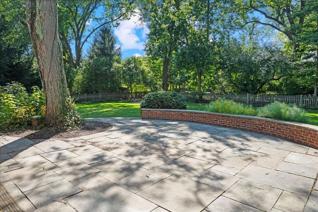 a view of outdoor space with deck and yard