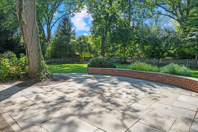 a view of outdoor space with deck and yard