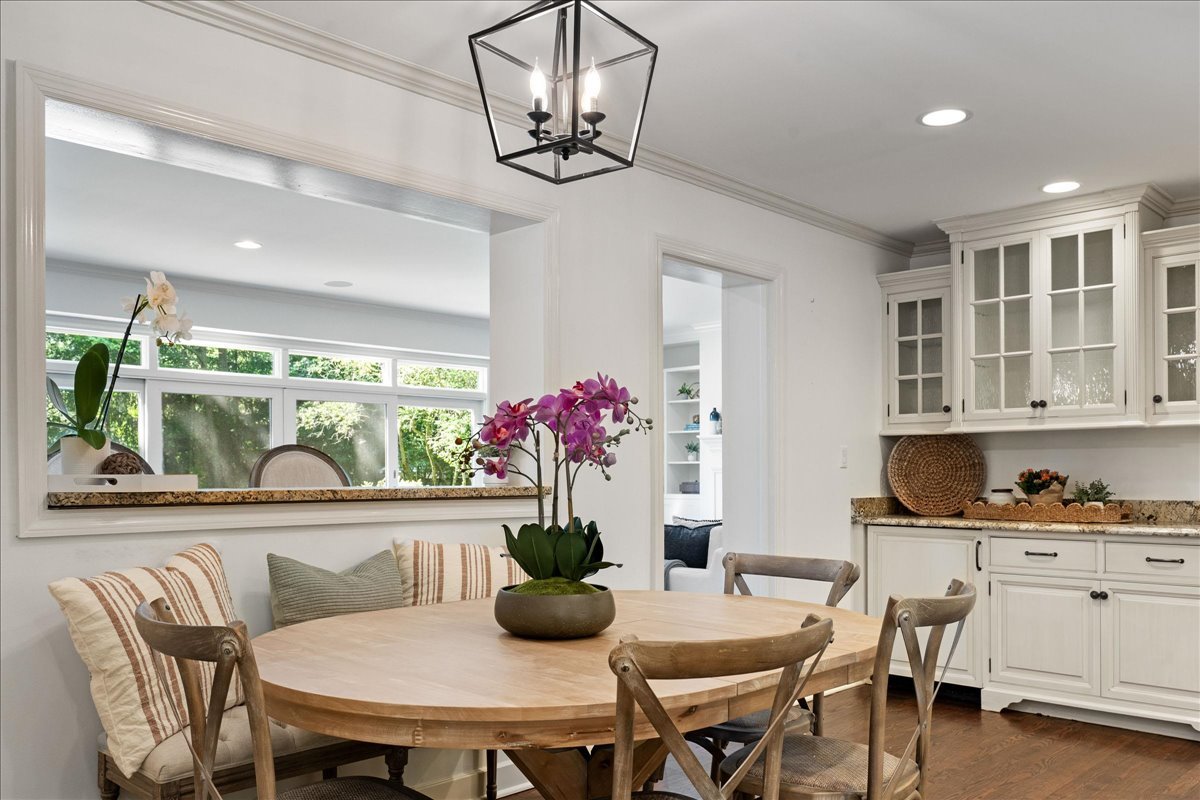 180 Apple Tree Road Winnetka, IL 60093 - Photo 25 of 49 a view of a dining room with furniture window and outside view