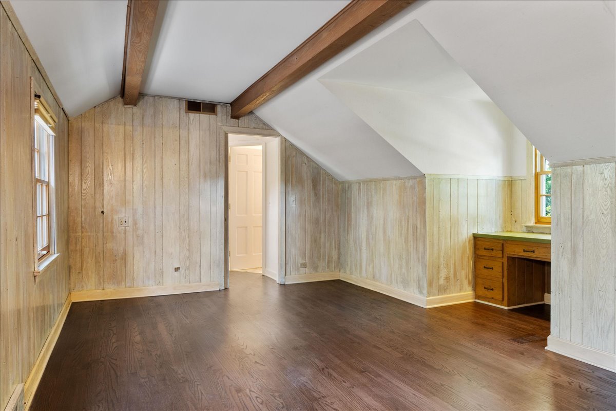 180 Apple Tree Road Winnetka, IL 60093 - Photo 40 of 49 wooden floor in an empty room with a fireplace