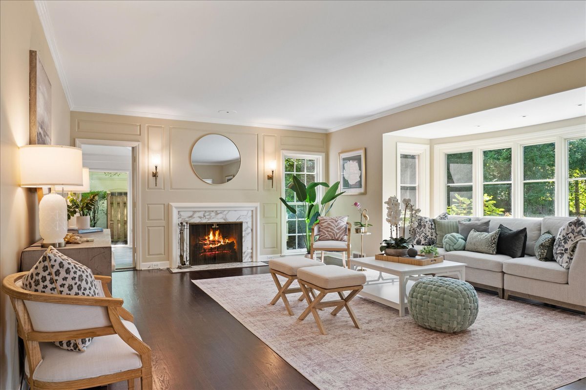 180 Apple Tree Road Winnetka, IL 60093 - Photo 5 of 49 a living room with furniture and a fireplace