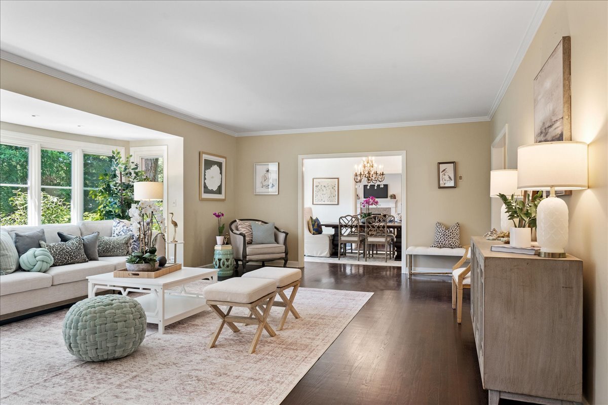180 Apple Tree Road Winnetka, IL 60093 - Photo 8 of 49 a living room with furniture and a table