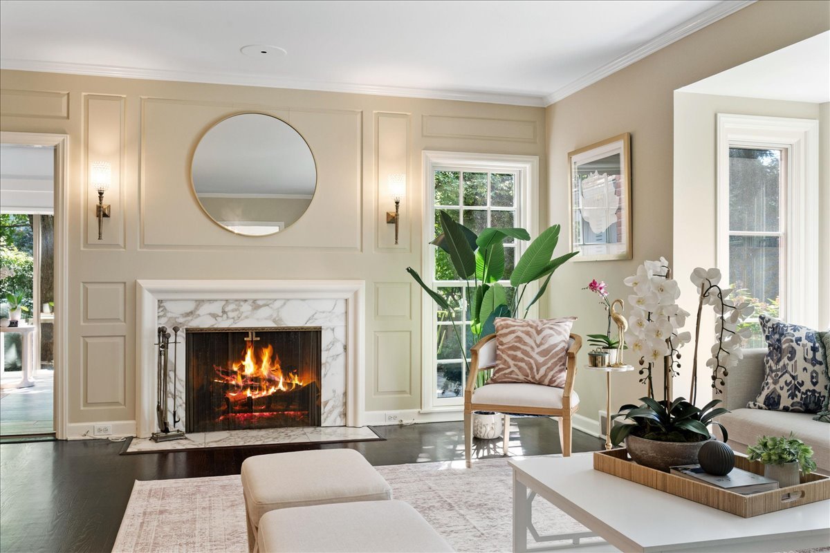 180 Apple Tree Road Winnetka, IL 60093 - Photo 9 of 49 a living room with furniture and a fireplace