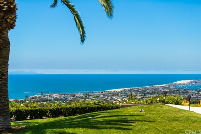 a view of a city with an ocean view