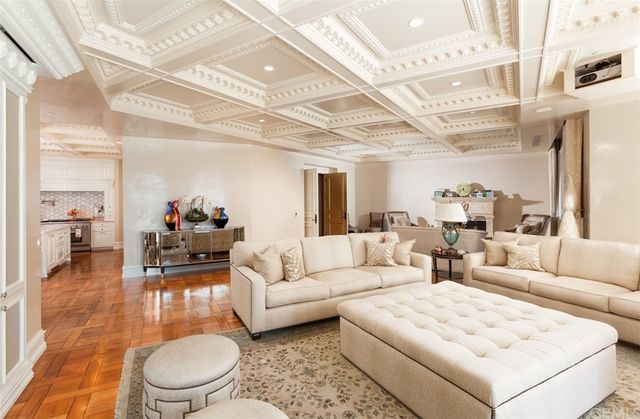 a view of a grassy field with an trees