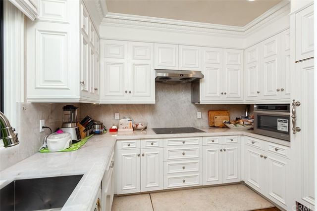 a view of a street next to a yard