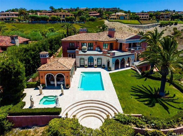 an aerial view of a house with a garden