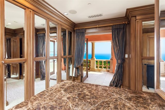 a view of swimming pool with a table and chairs