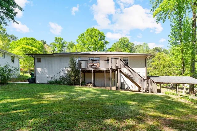 a view of a house with a back yard