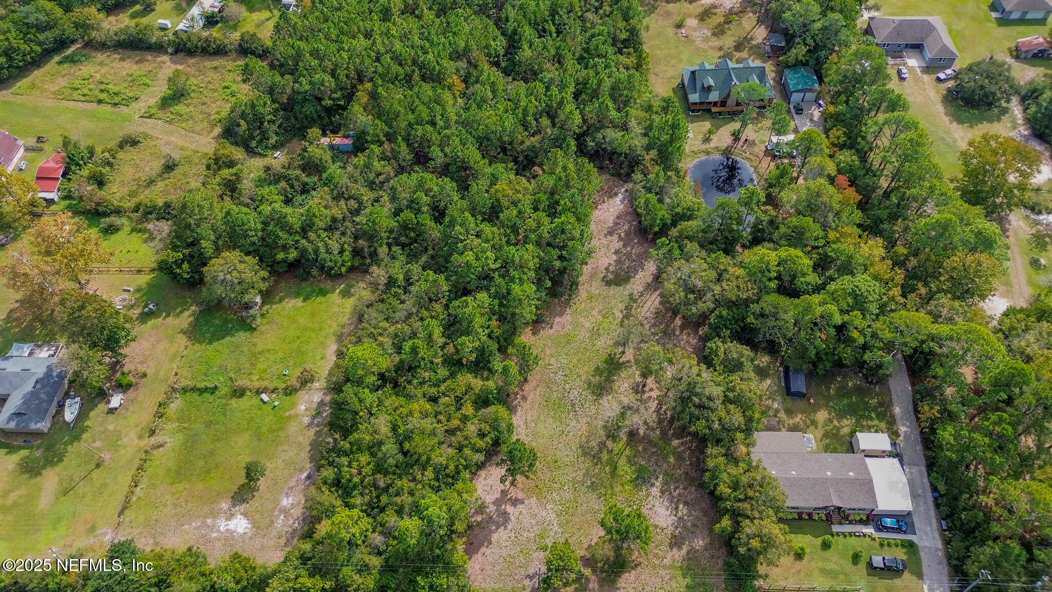 0 Flounder Road Jacksonville, FL 32226 - Photo 4 of 8 an aerial view of residential house with outdoor space and trees all around