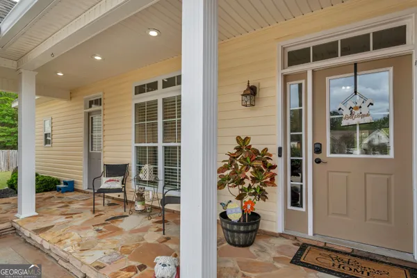 a view of porch with a potted plant