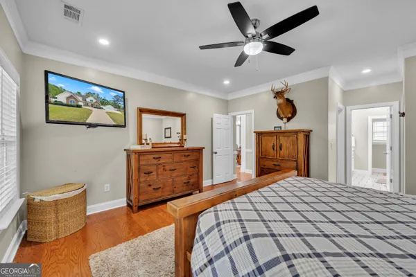 a bed room with a bed and furniture