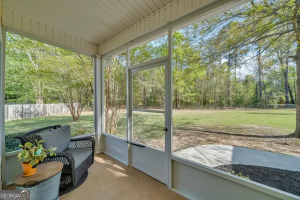 a view of a porch and garden