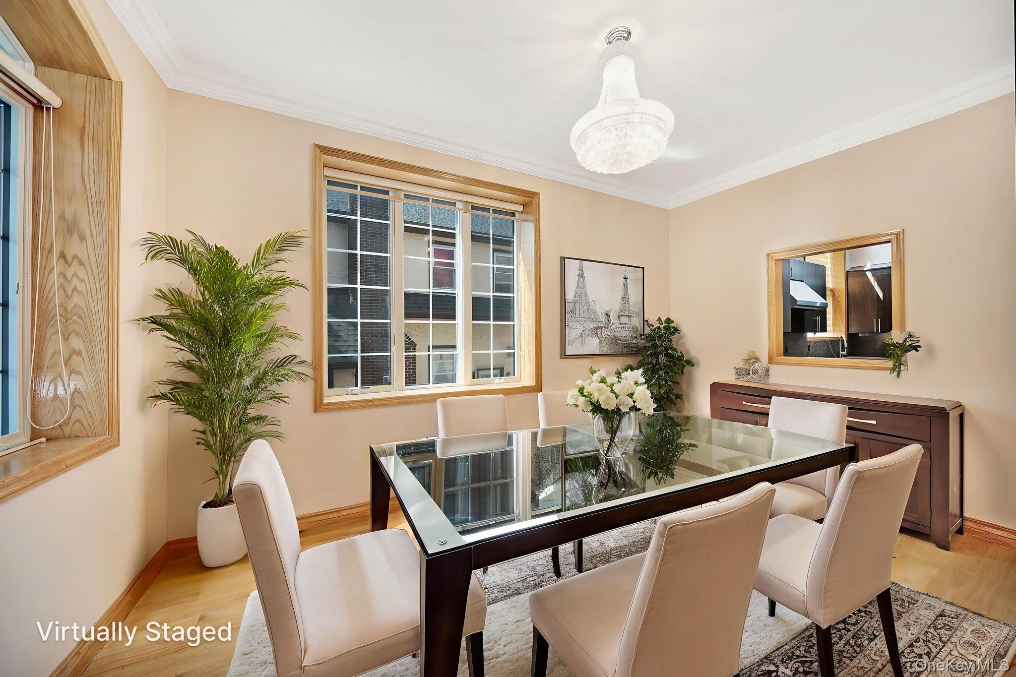 84-29 Kendrick Place Queens, NY 11432 - Photo 11 of 50 a dining room with furniture and window