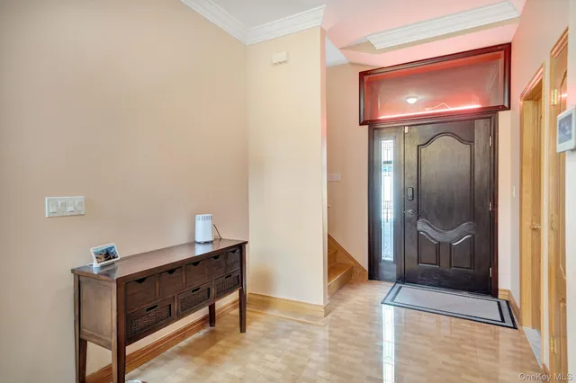 a room with painting and a table