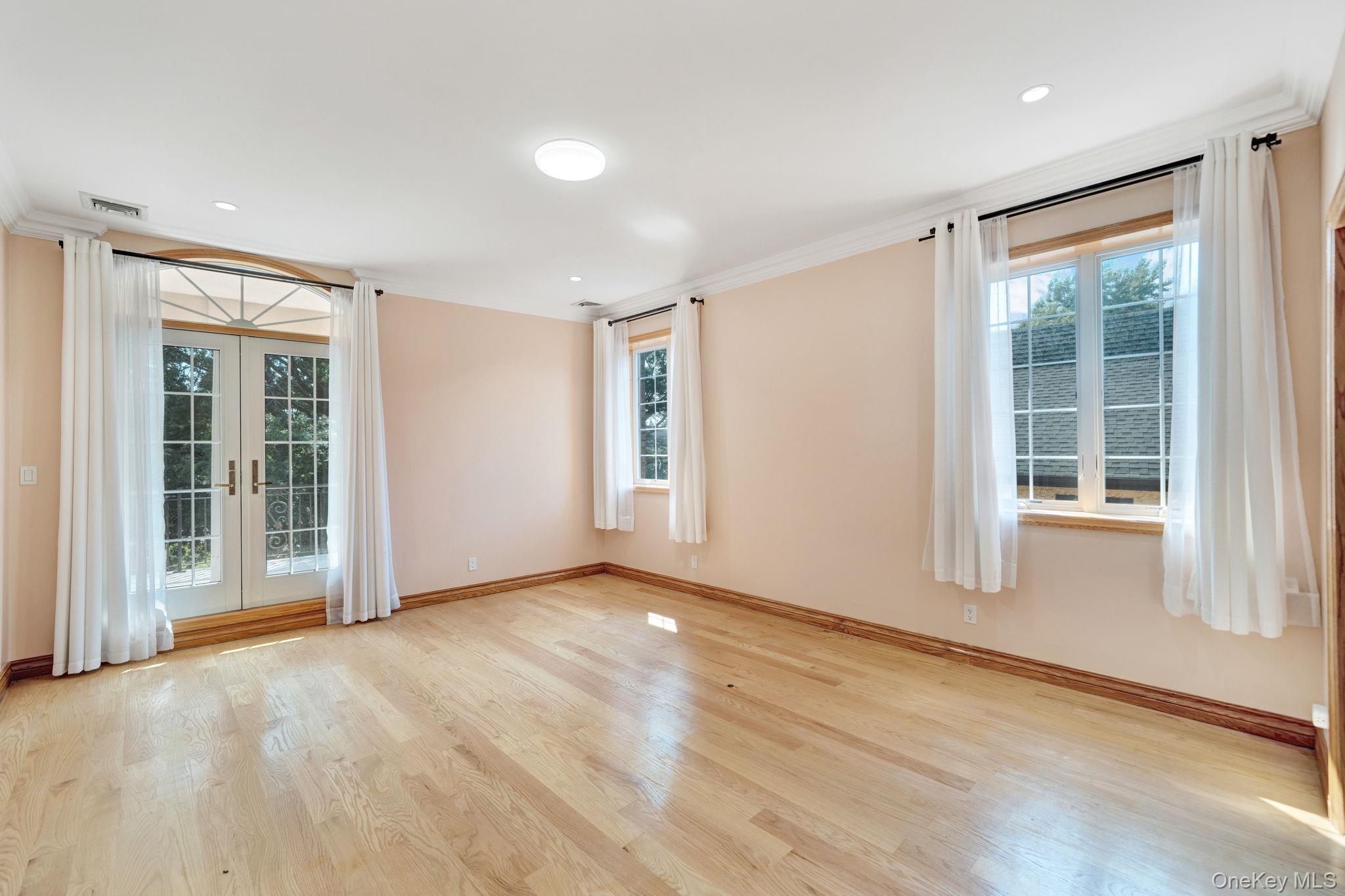 84-29 Kendrick Place Queens, NY 11432 - Photo 23 of 50 a view of an empty room with a window