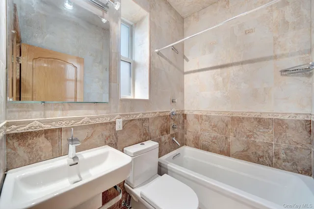 a bathroom with a sink and a bathtub