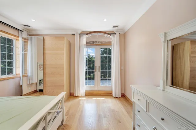 a view of a kitchen with a sink and a large window