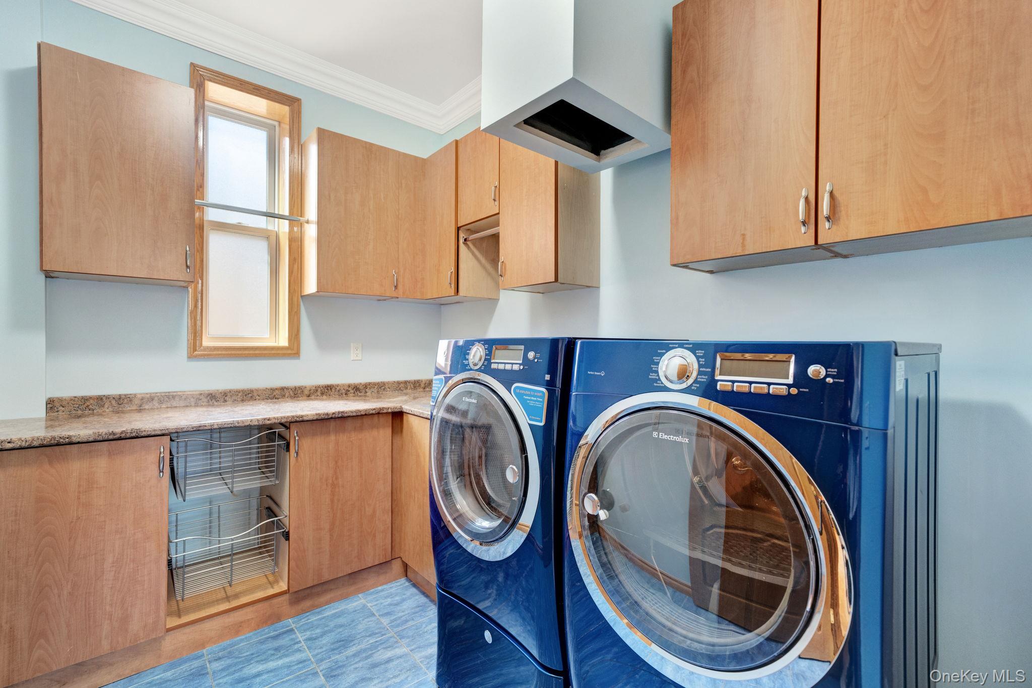 84-29 Kendrick Place Queens, NY 11432 - Photo 39 of 50 a utility room with sink dryer and washer