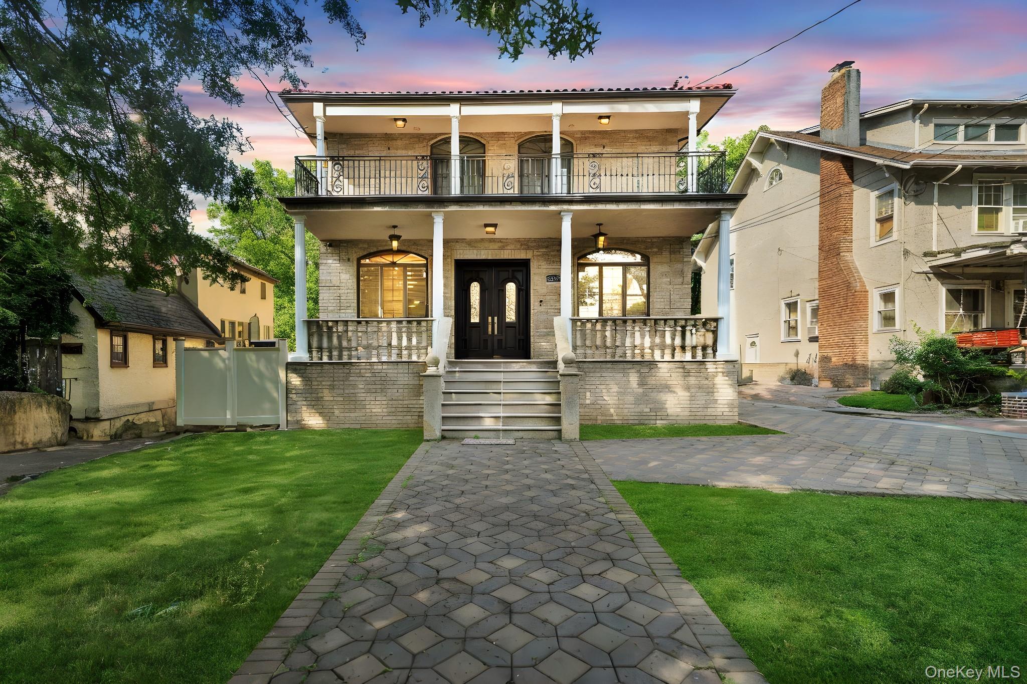 84-29 Kendrick Place Queens, NY 11432 - Photo 4 of 50 a front view of a house with a yard