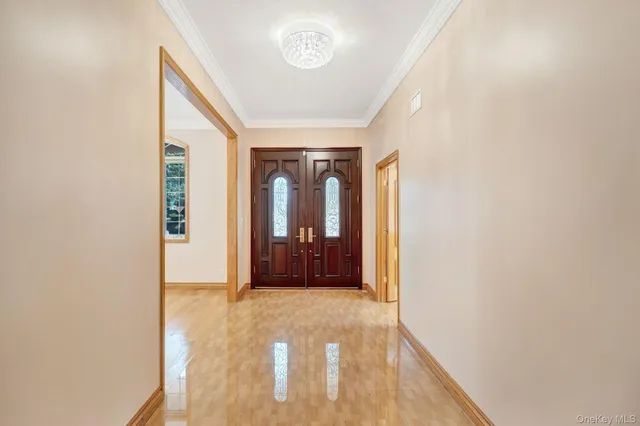 a view of hallway with livingroom