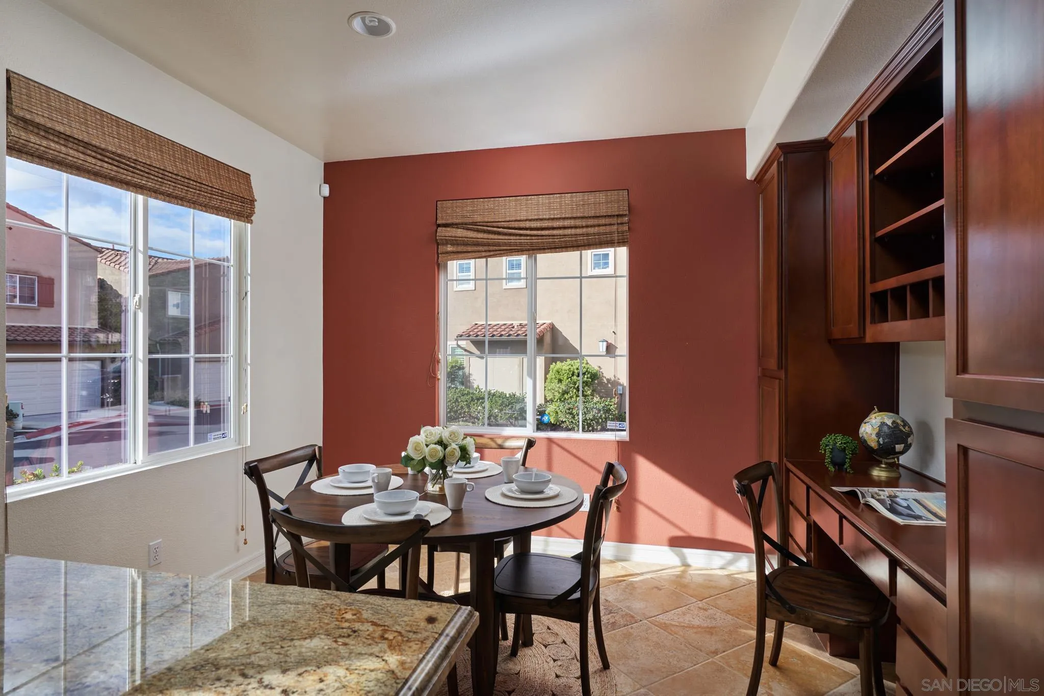 3177 Via Iris Carlsbad, CA 92009 - Photo 11 of 31 a view of a dining room with furniture and window