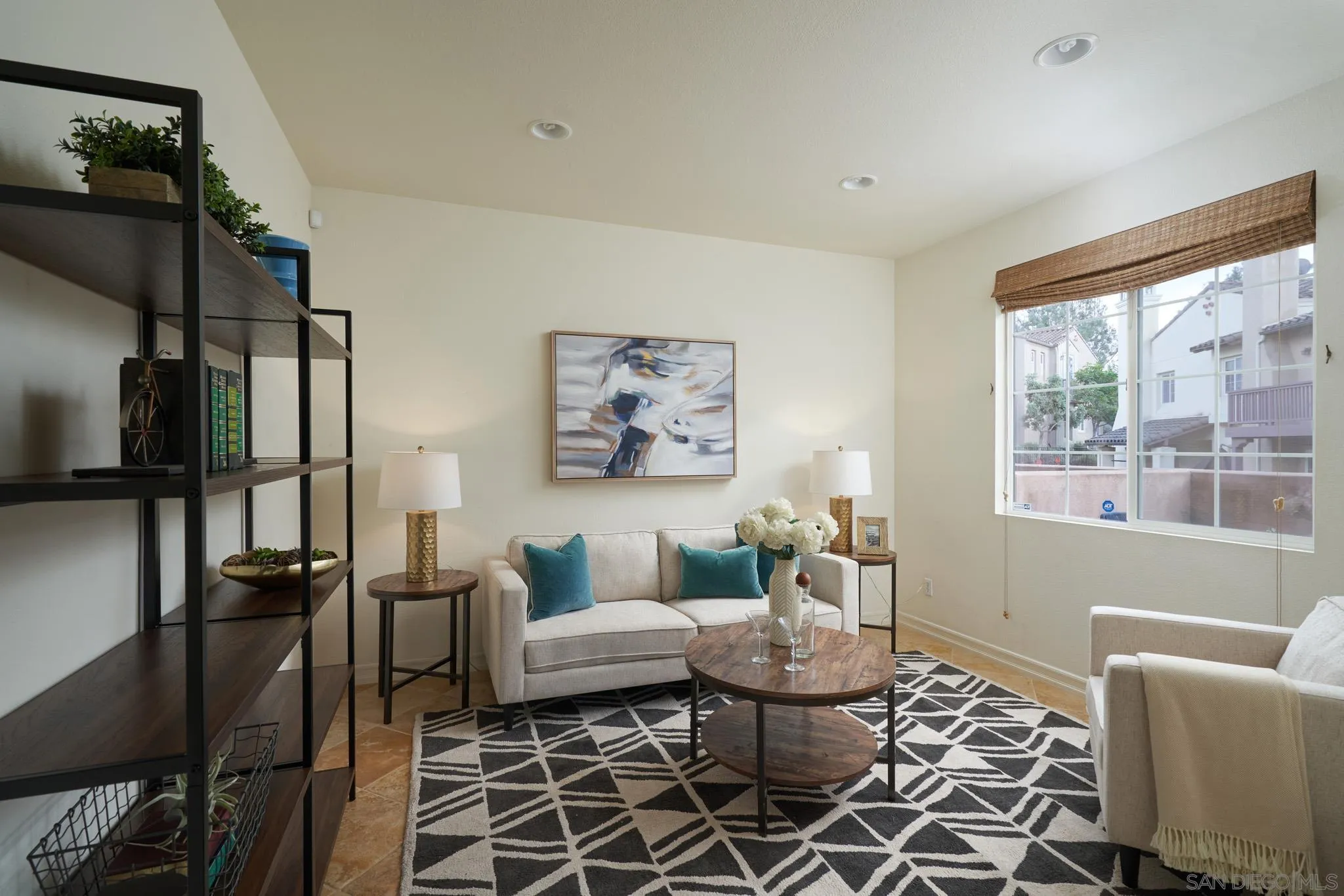3177 Via Iris Carlsbad, CA 92009 - Photo 12 of 31 a living room with furniture and a floor to ceiling window