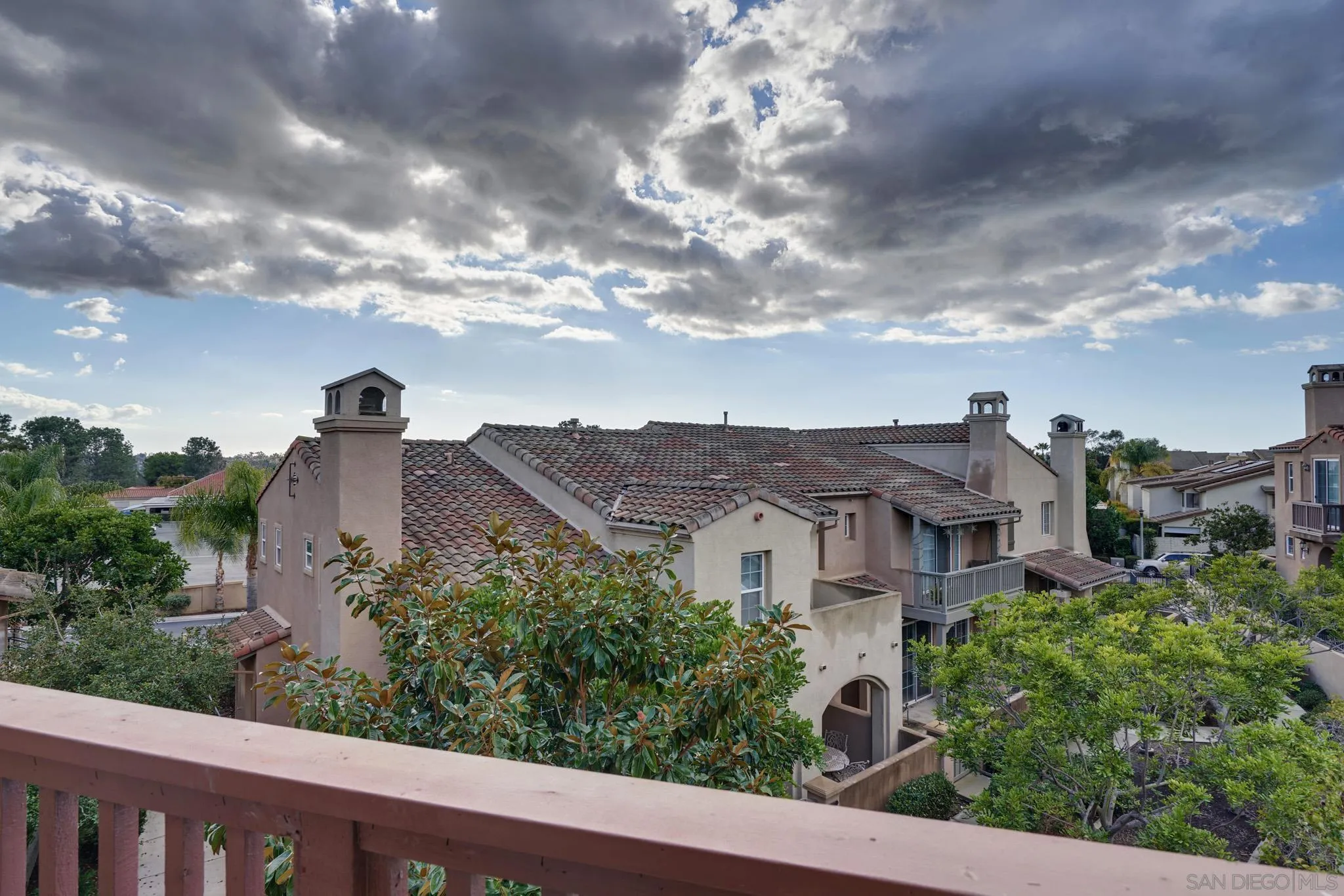 3177 Via Iris Carlsbad, CA 92009 - Photo 14 of 31 an aerial view of multiple houses with a yard
