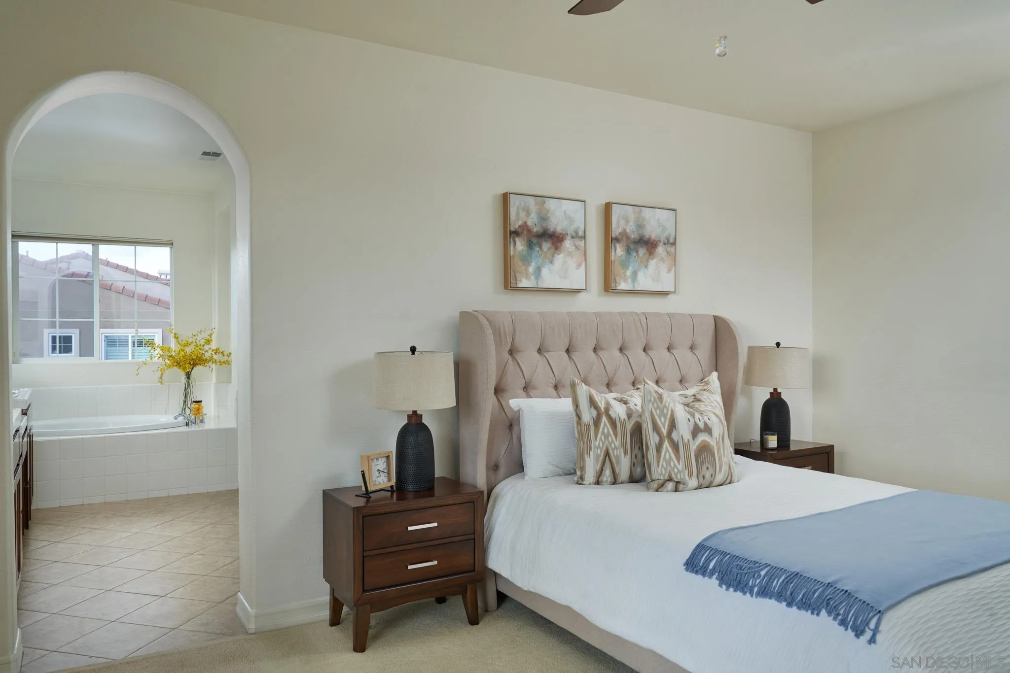 3177 Via Iris Carlsbad, CA 92009 - Photo 16 of 31 a bedroom with a bed and window