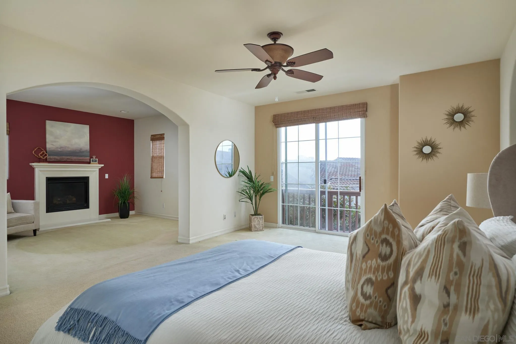 3177 Via Iris Carlsbad, CA 92009 - Photo 17 of 31 a bedroom with a bed and a chandelier
