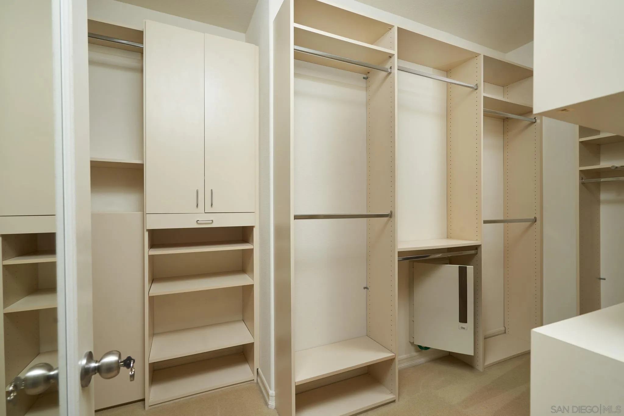3177 Via Iris Carlsbad, CA 92009 - Photo 18 of 31 a view of walk in closet with empty racks