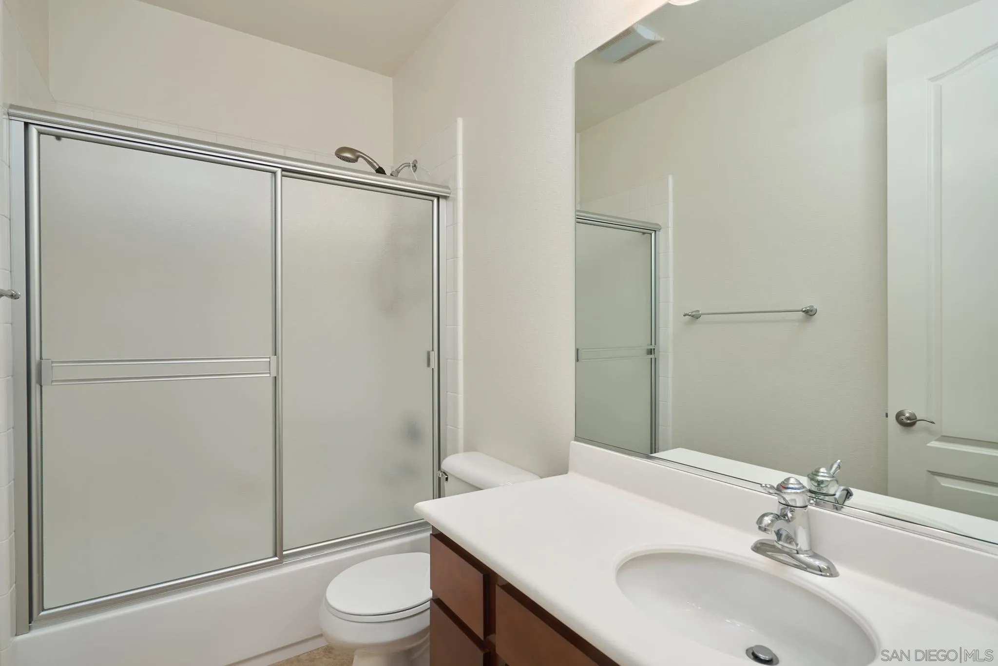 3177 Via Iris Carlsbad, CA 92009 - Photo 20 of 31 a bathroom with a sink toilet and shower