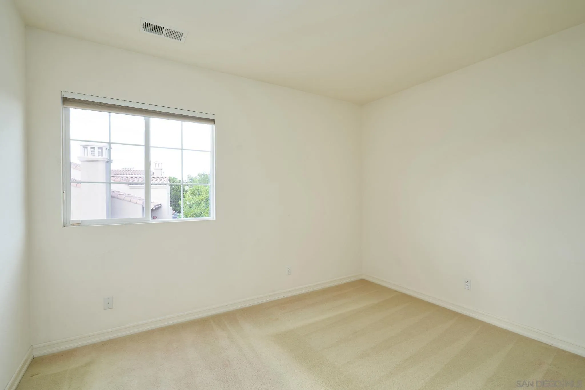 3177 Via Iris Carlsbad, CA 92009 - Photo 23 of 31 an empty room with a window