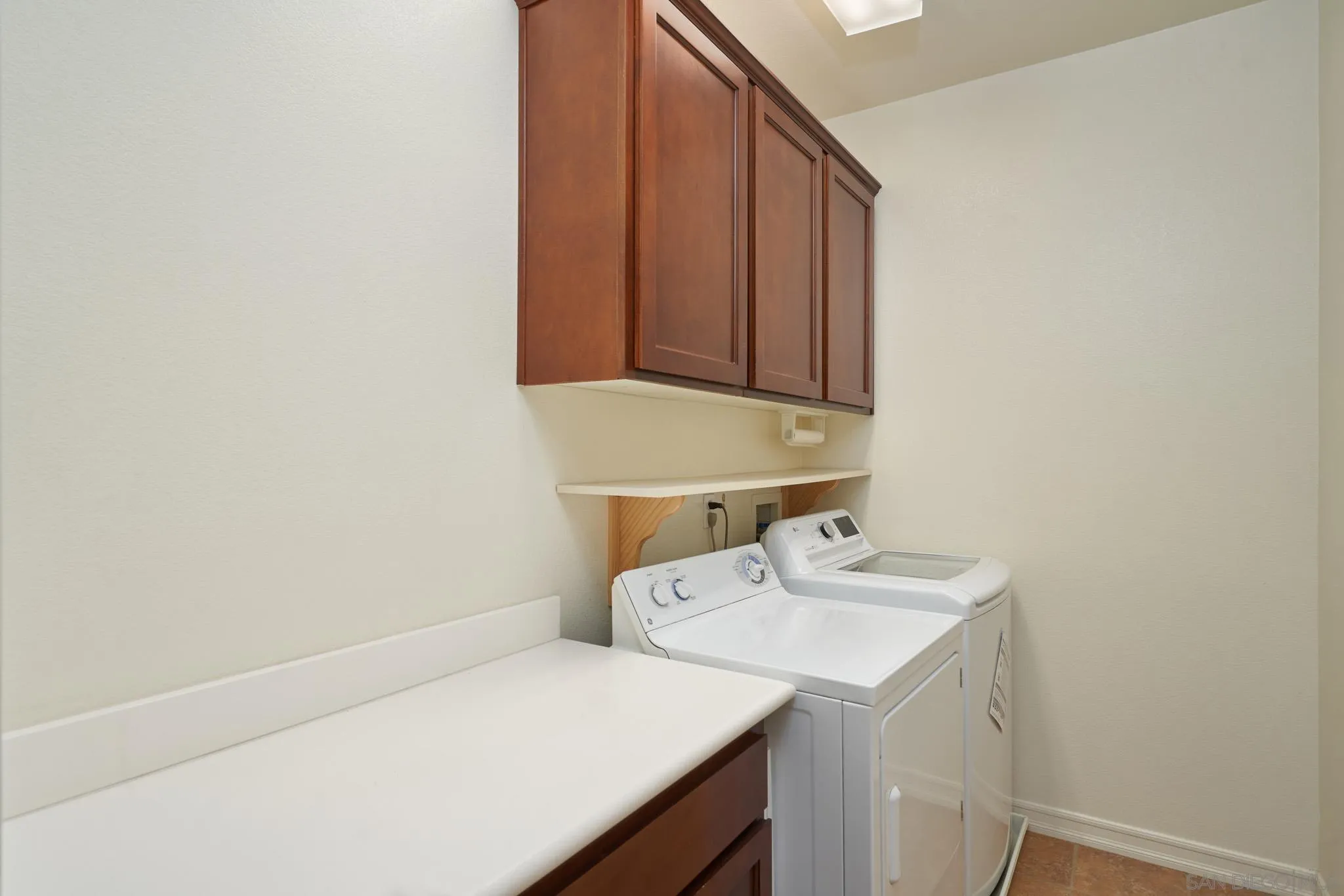 3177 Via Iris Carlsbad, CA 92009 - Photo 24 of 31 a bathroom with a sink and a mirror