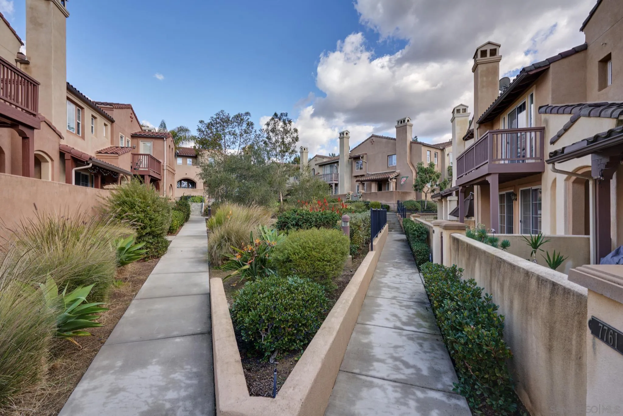 3177 Via Iris Carlsbad, CA 92009 - Photo 25 of 31 a view of a pathway both side of the house
