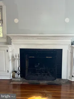 a view of fireplace and window