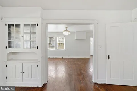 a kitchen with a sink cabinets and stainless steel appliances