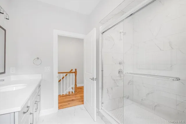 a bathroom with a bathtub and a sink