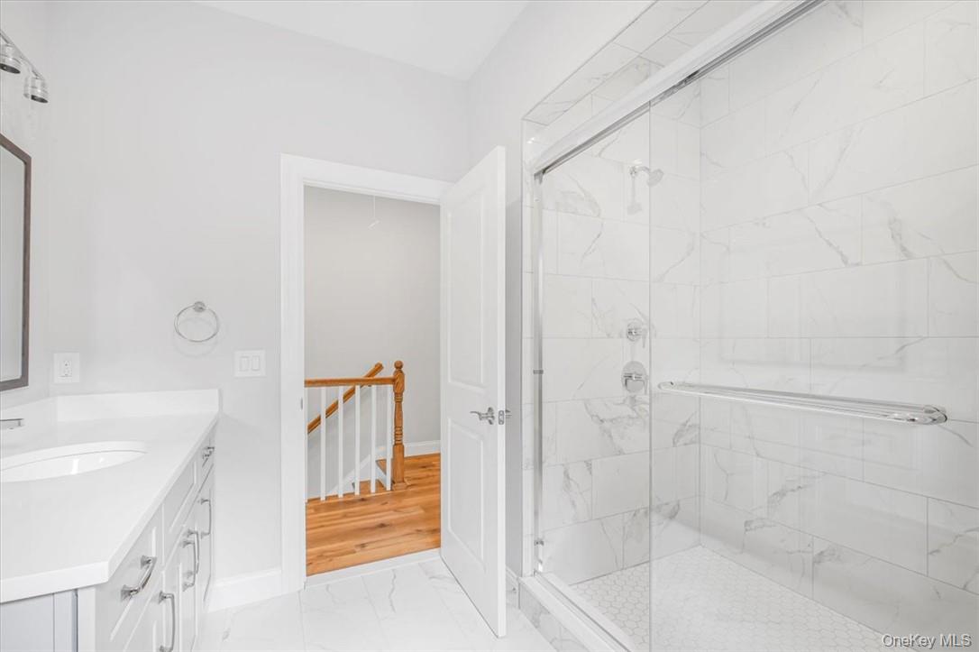 125 Vail Avenue, Unit F Peekskill, NY 10566 - Photo 19 of 26 a bathroom with a bathtub and a sink