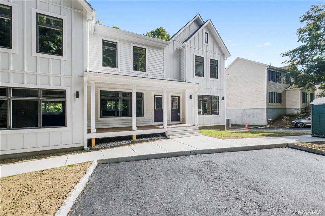 125 Vail Avenue, Unit F Peekskill, NY 10566 - Photo 2 of 26 a view of an house with swimming pool and porch