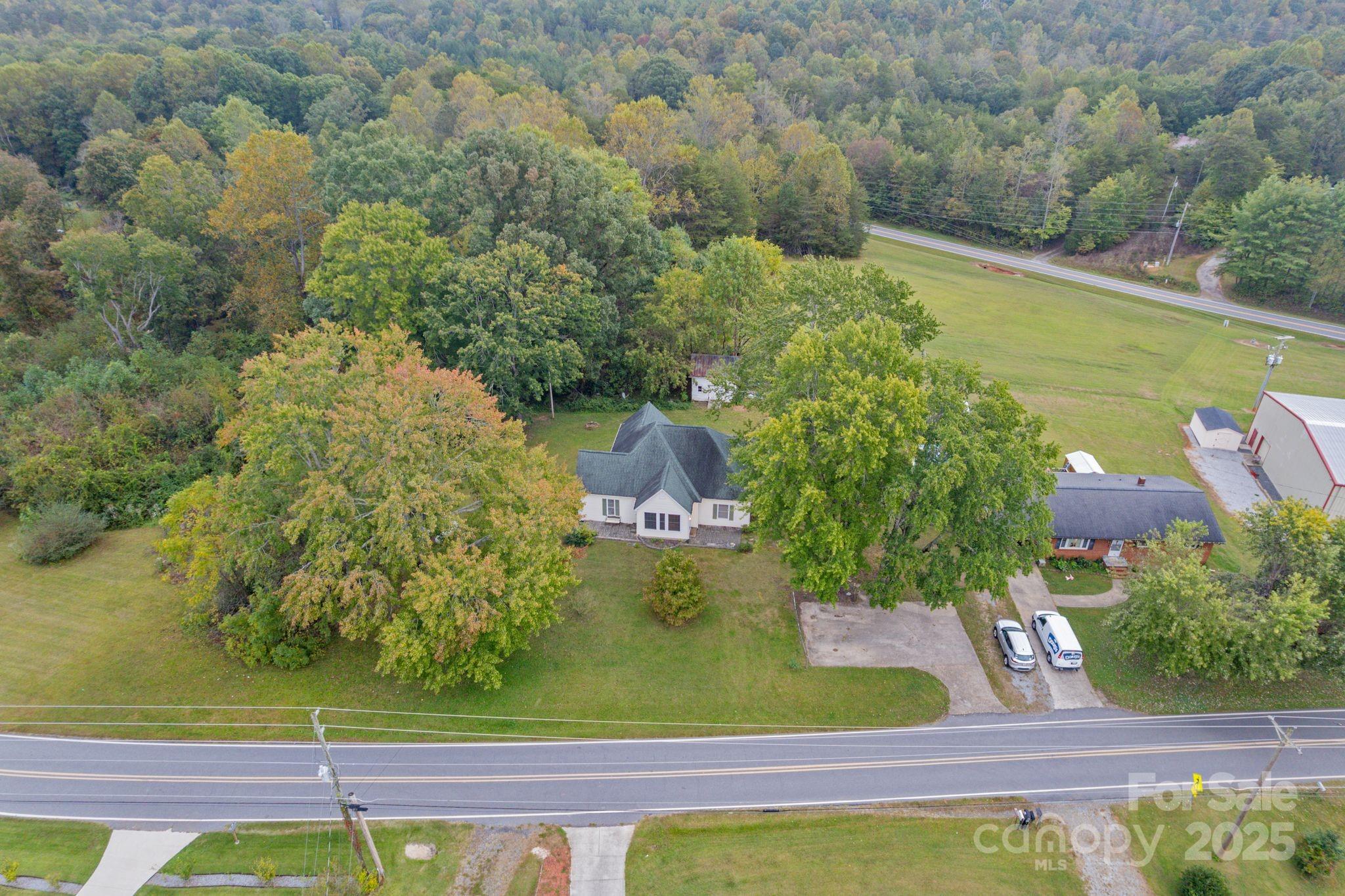 6921 Harmony Grove Road Nebo, NC 28761 - Photo 19 of 20 a view of swimming pool with a yard