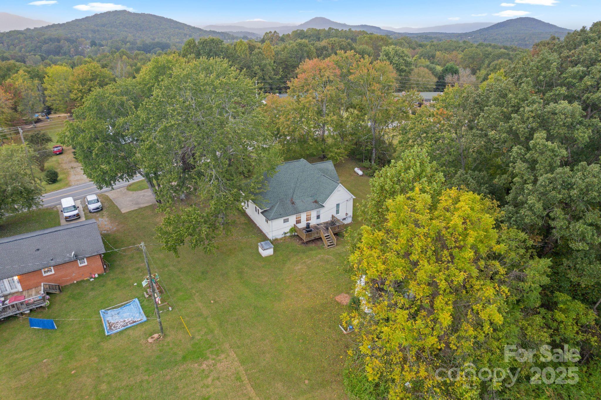 6921 Harmony Grove Road Nebo, NC 28761 - Photo 20 of 20 an aerial view of a house with a yard