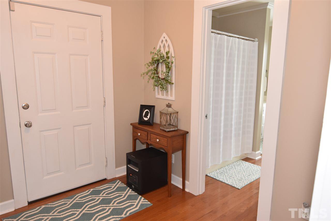 2001 Harvey Lewis Road Faison, NC 28341 - Photo 12 of 25 a view of a livingroom with wooden floor and a window